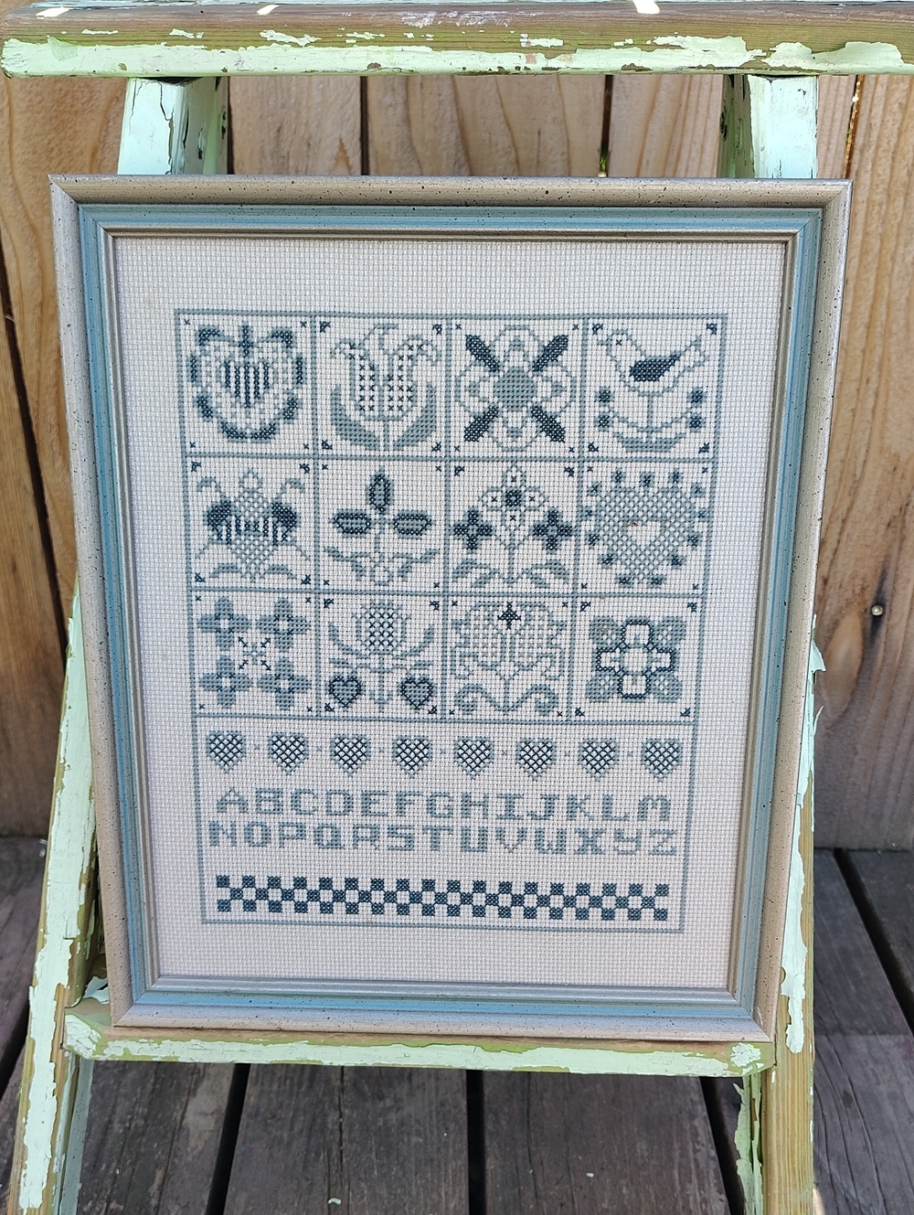 Vintage Blue and Cream Cross-Stitch Sampler in Frame
